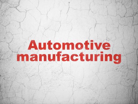 Industry concept: Red Automotive Manufacturing on textured concrete wall background