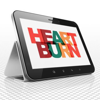 Health concept: Tablet Computer with Painted multicolor text Heartburn on display, 3D rendering