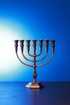 Traditional jewish menorah on nice blue background