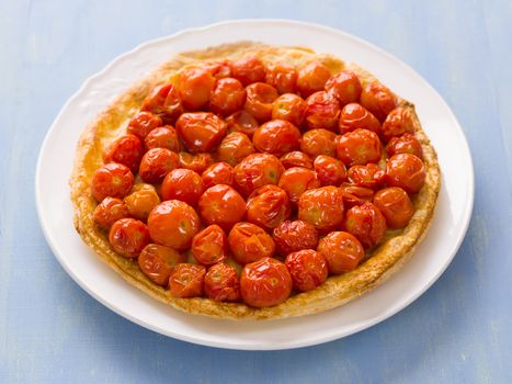 close up of rustic cherry tomato tarte tatin