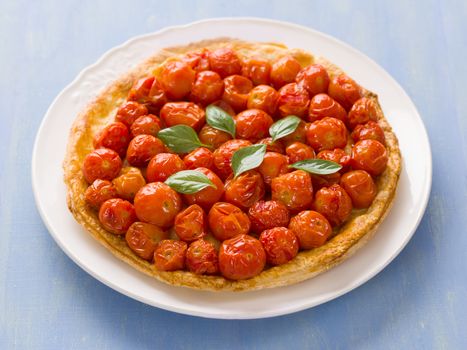 close up of rustic cherry tomato tarte tatin