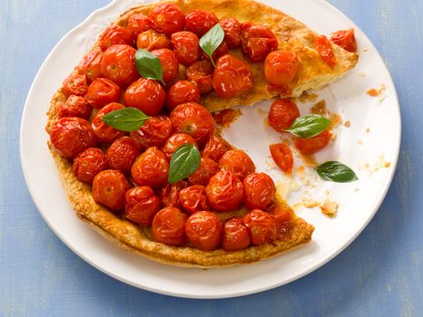 close up of rustic cherry tomato tarte tatin