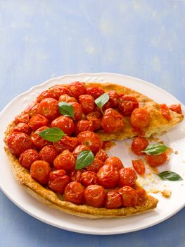 close up of rustic cherry tomato tarte tatin