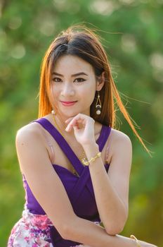 Portrait of a Asian woman wearing dress beauty fashion in summer.