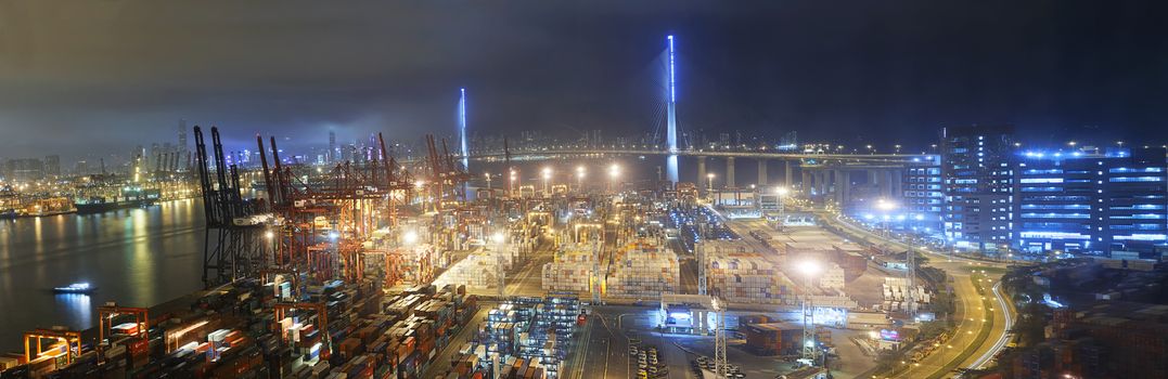 Container port in Hong Kong at night 