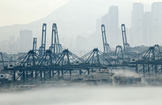 Hong Kong cargo port in mist