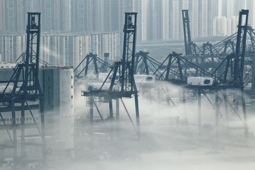 Hong Kong cargo port in mist