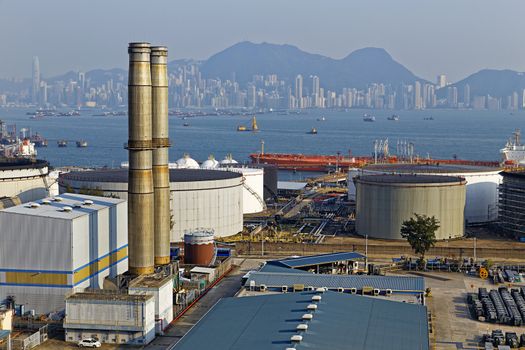 petrochemical industry on sunset , hong kong coal power station and oil tank