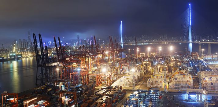 Container port in Hong Kong at night 