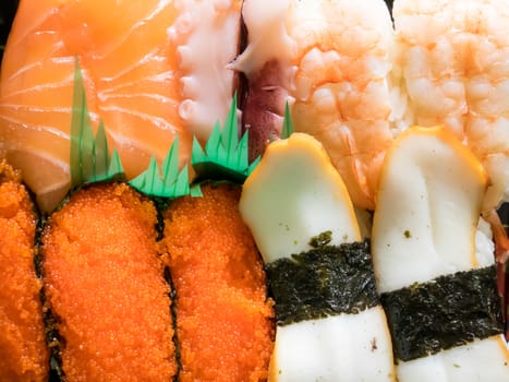 The close up of Japanese delicious sushi in lunch box set.