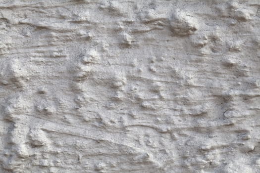 Macro shot of uneven wall plaster, texture