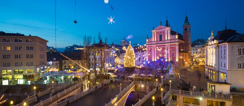 Romantic Ljubljana's city center decorated for Christmas holiday. Preseren's square, Ljubljana, Slovenia, Europe. Panoramic view.