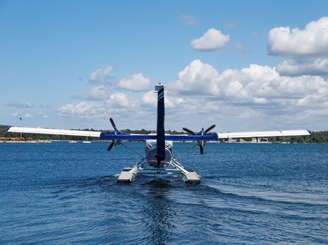 seaplane prepare for take off, back side view      