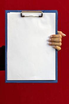 girl with French manicure keeps clip board
