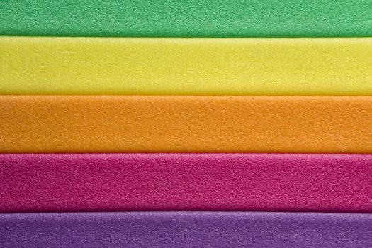 multicolored strips of yellow, pink, purple, orange background