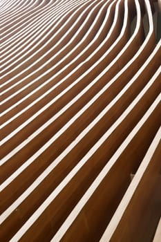 The outer wall of a commercial building representative waves of the sea