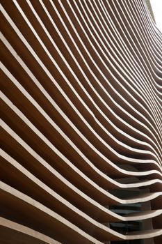 The outer wall of a commercial building representative waves of the sea