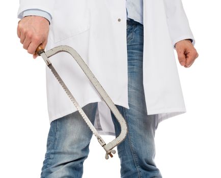 Crazy doctor is holding a big saw in his hands, isolated on white