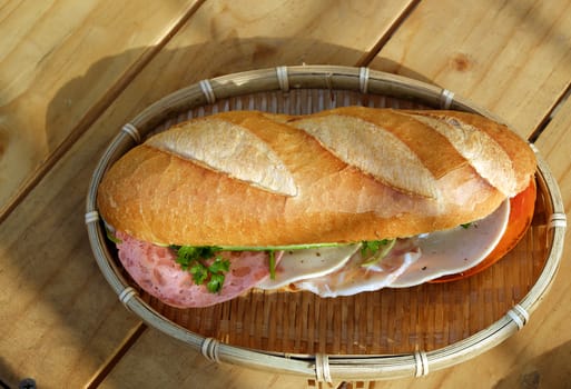 Vietnamese food, banh mi Viet Nam, a famous eating for morning with tasty and convenient for modern life, bread on table for breakfast as fast food product in Vietnam