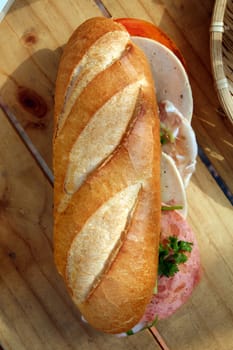 Vietnamese food, banh mi Viet Nam, a famous eating for morning with tasty and convenient for modern life, bread on table for breakfast as fast food product in Vietnam