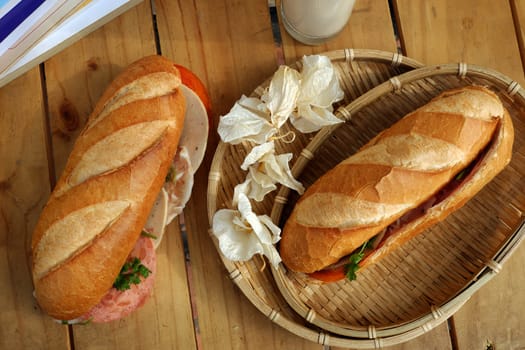 Vietnamese food, banh mi Viet Nam, a famous eating for morning with tasty and convenient for modern life, bread on table for breakfast as fast food product in Vietnam