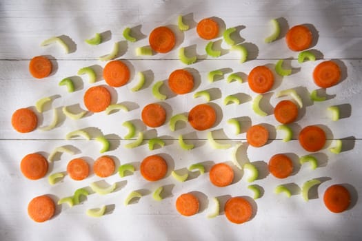 Presentation of vegetables celery and carrots cut into small slices