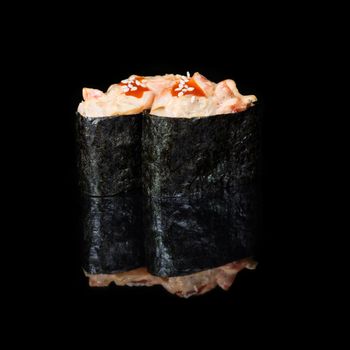 Vertical rolls with pieces of shrimp and creamy sause