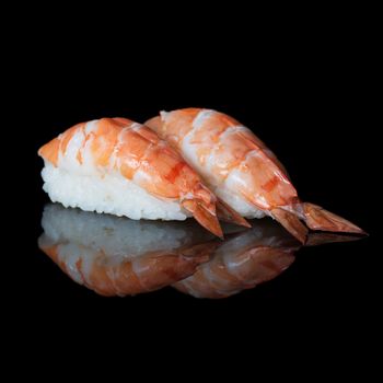 Shrimp sushi on black background