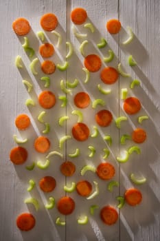 Presentation of vegetables celery and carrots cut into small slices