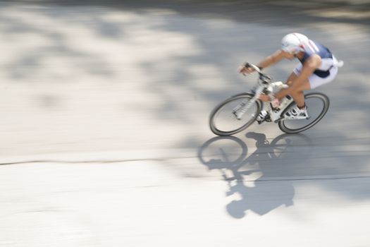 Cycling race with representation runner with blur