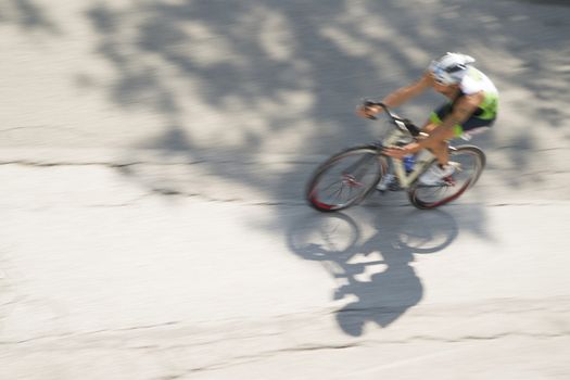 Cycling race with representation runner with blur