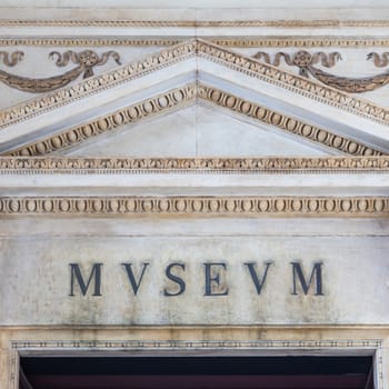 Detail of an old Museum sign in Italy - almost 200 years old