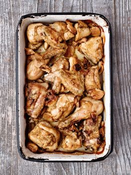 close up of rustic golden roast chicken casserole 