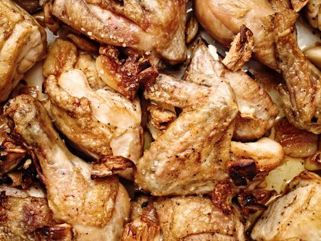 close up of golden roast chicken casserole food background