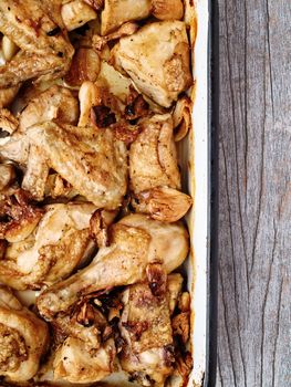 close up of rustic golden roast chicken casserole 