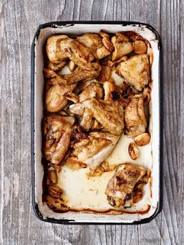 close up of rustic golden roast chicken casserole 