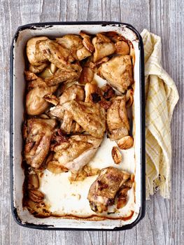 close up of rustic golden roast chicken casserole 