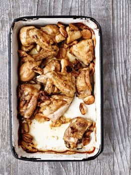 close up of rustic golden roast chicken casserole 