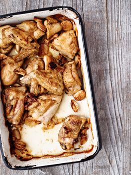 close up of rustic golden roast chicken casserole 