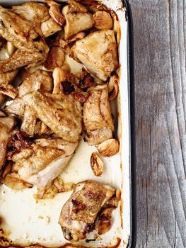 close up of rustic golden roast chicken casserole 