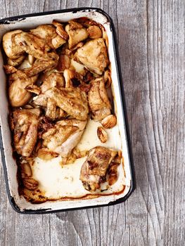 close up of rustic golden roast chicken casserole 