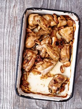 close up of rustic golden roast chicken casserole 