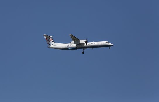 Bombardier DH8D, registration 9A-CQF of Croatia Airlines landing on Zagreb Airport Pleso