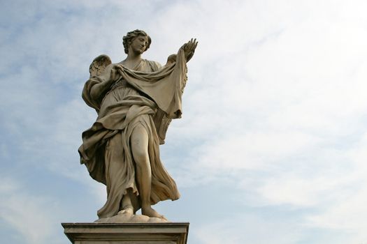 Bernini's angel along the Holy Angel bridge near the Hadrian Mausoleum in Rome, Italy