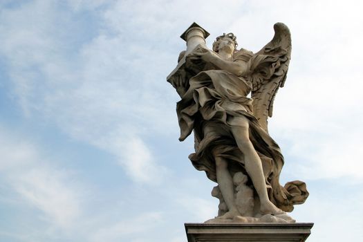 Bernini's angel along the Holy Angel bridge near the Hadrian Mausoleum in Rome, Italy