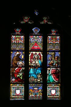 Nativity Scene, Adoration of the Magi, stained glass window in parish church of Saint Mark in Zagreb, Croatia