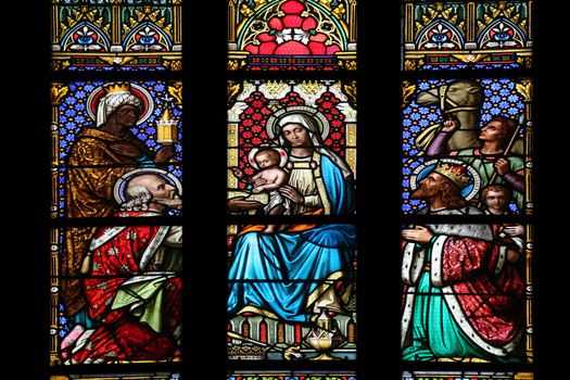 Nativity Scene, Adoration of the Magi, stained glass window in parish church of Saint Mark in Zagreb, Croatia