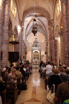 Mass for pilgrims in the Cathedral of Saint Tryphon. Kotor Bay is also known as the Bay of Saints in Kotor, Montenegro