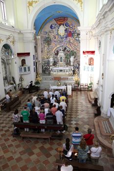 Mass for pilgrims in the Catholic Church Saint Eustache in Dobrota, Montenegro