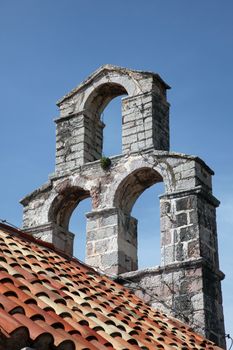 The bell tower of the church of Saint Mary in Punta, Budva, Montenegro